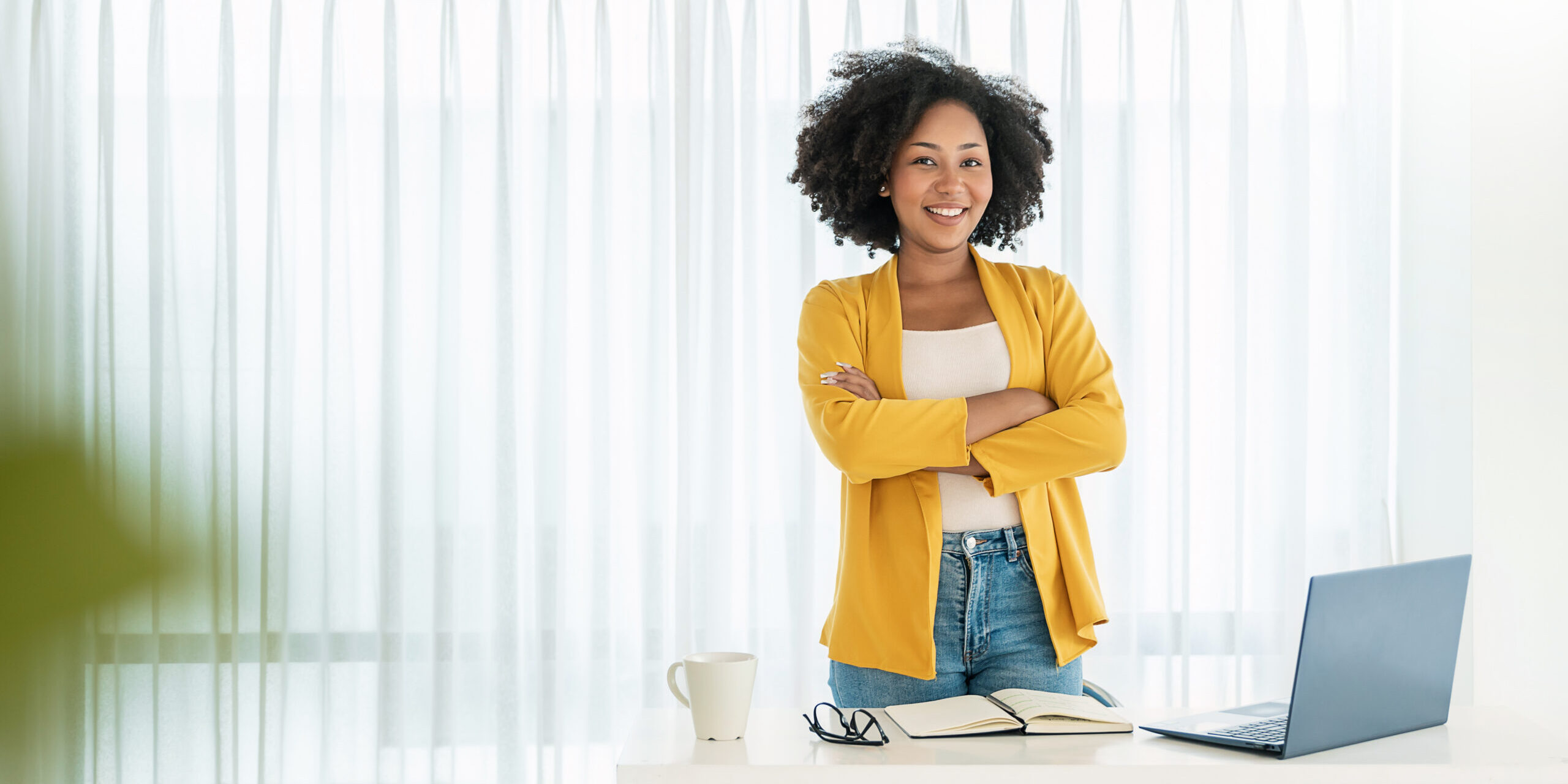 a smiling woman in a business office